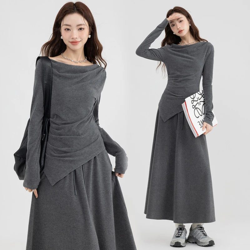 Set casual asimetric cu top și fustă cu umeri goi.