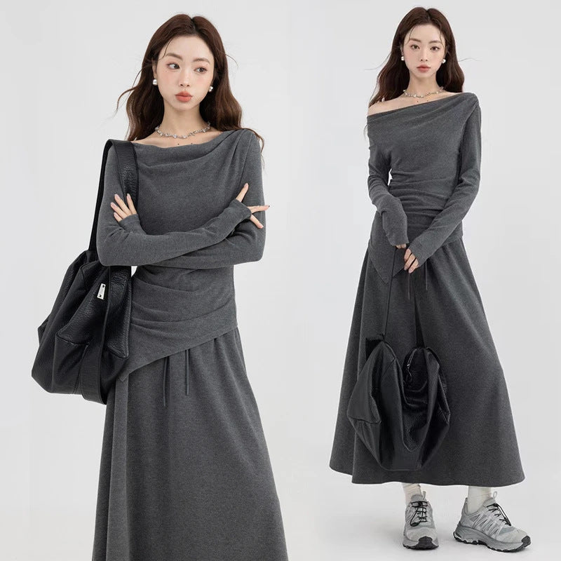 Set casual asimetric cu top și fustă cu umeri goi.